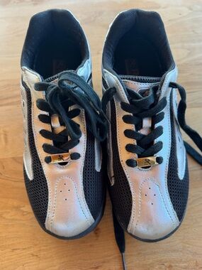 Ryn “walking rocking” shoes in Black and Silver
